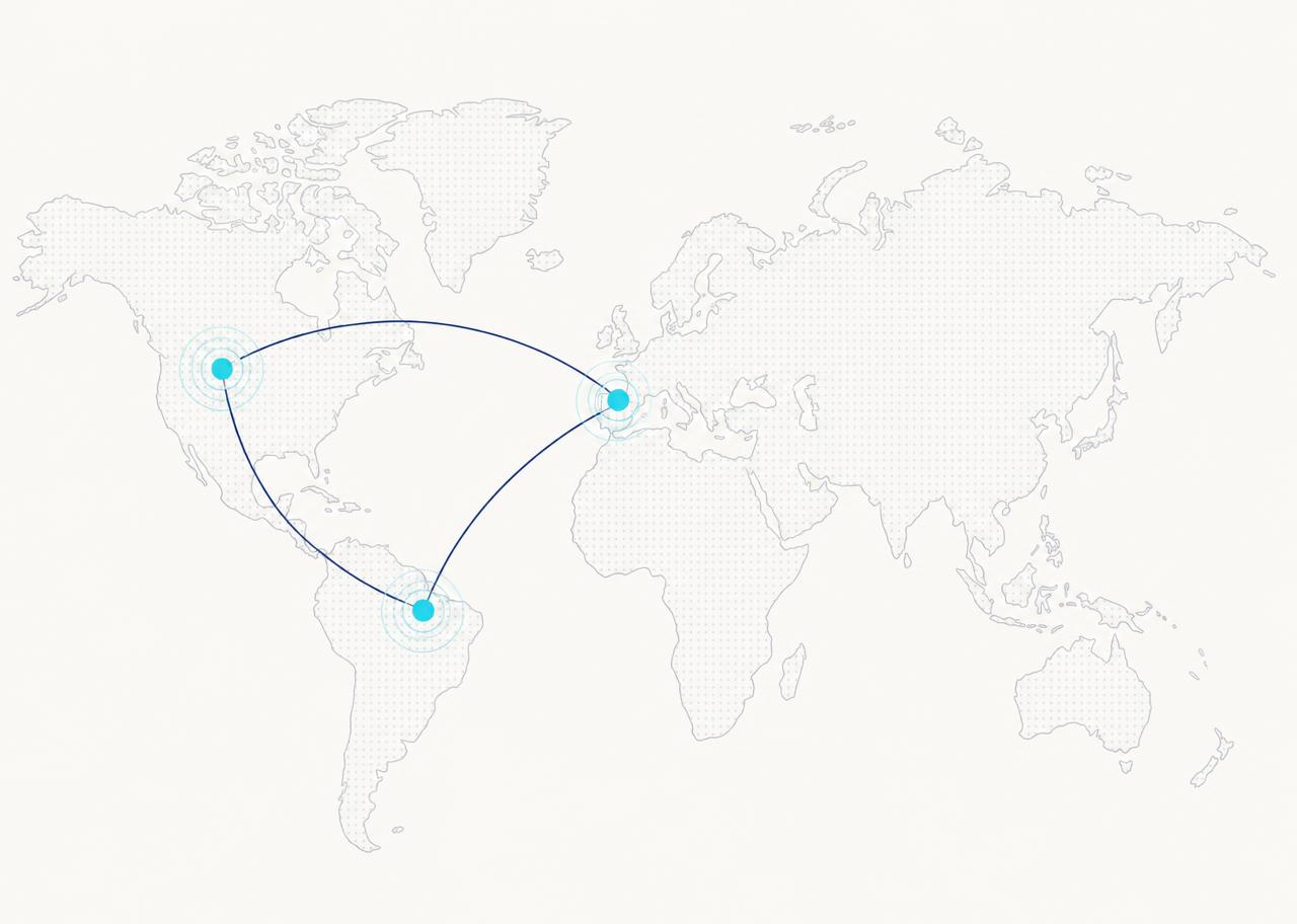 Mapa mundial minimalista con marcadores en Wyoming (EE. UU.), España y Latinoamérica